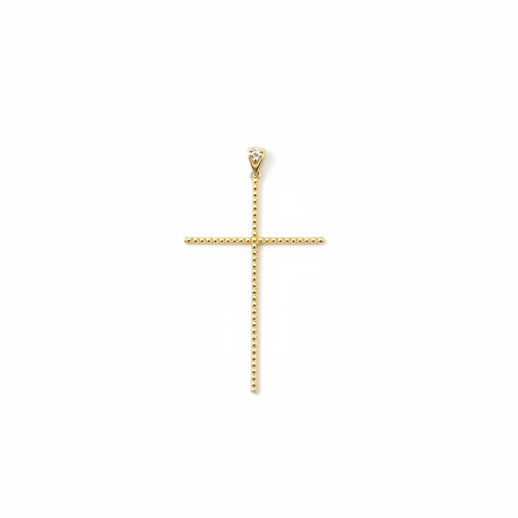 10k gold slim cross pendant with milgrain detailing on white background