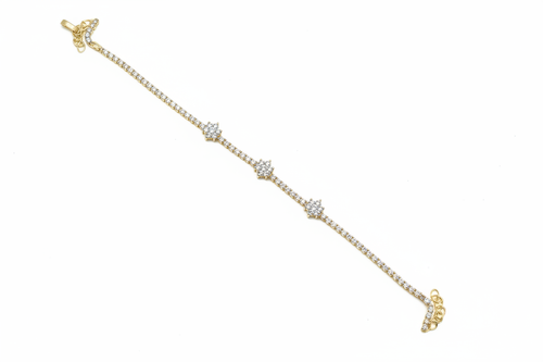 10k gold pavé tennis bracelet with three flower diamond cluster stations on white background