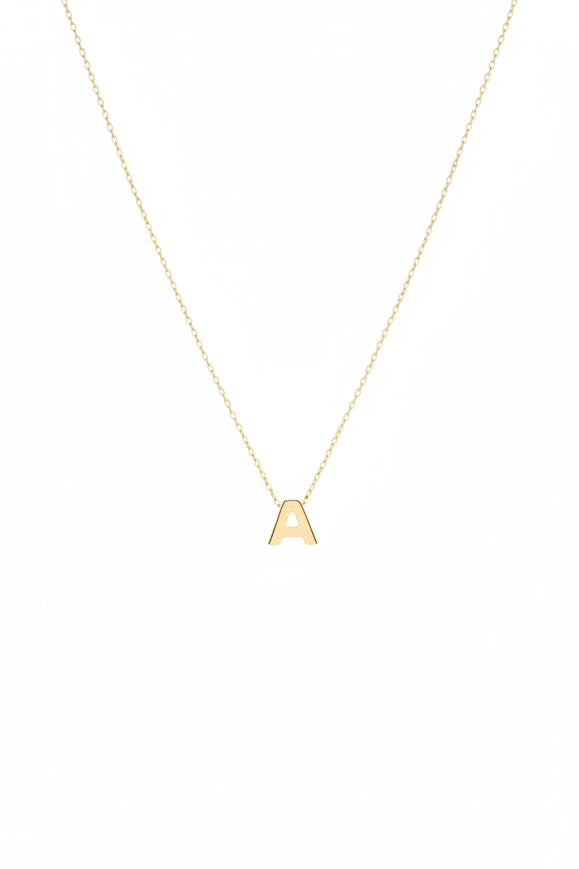 10k gold delicate cable chain necklace with block letter initial charm on white background