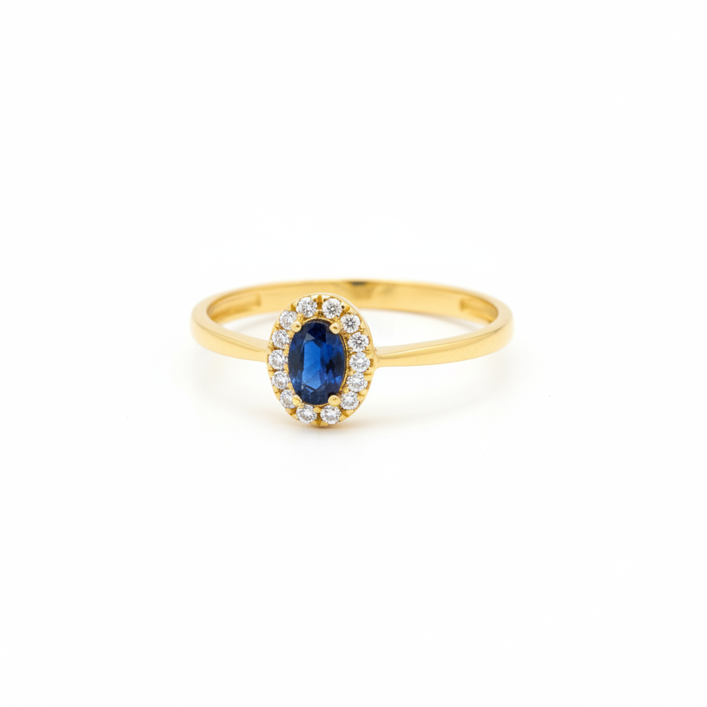 10k gold oval sapphire ring with diamond halo on white background
